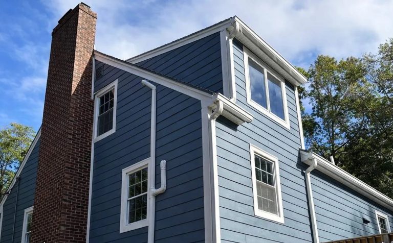 Newly installed blue siding